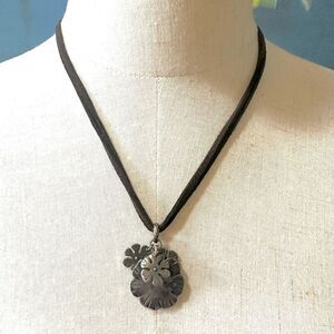 Lucky Brand silver tone four  flower pendant necklace